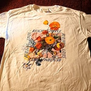 Comfort wash t-shirt reaching people building lives gently worn